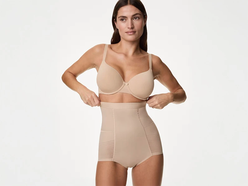 Women wearing beige shapewear.
