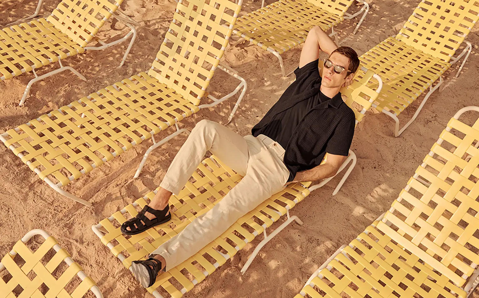 Man lying on sun lounger