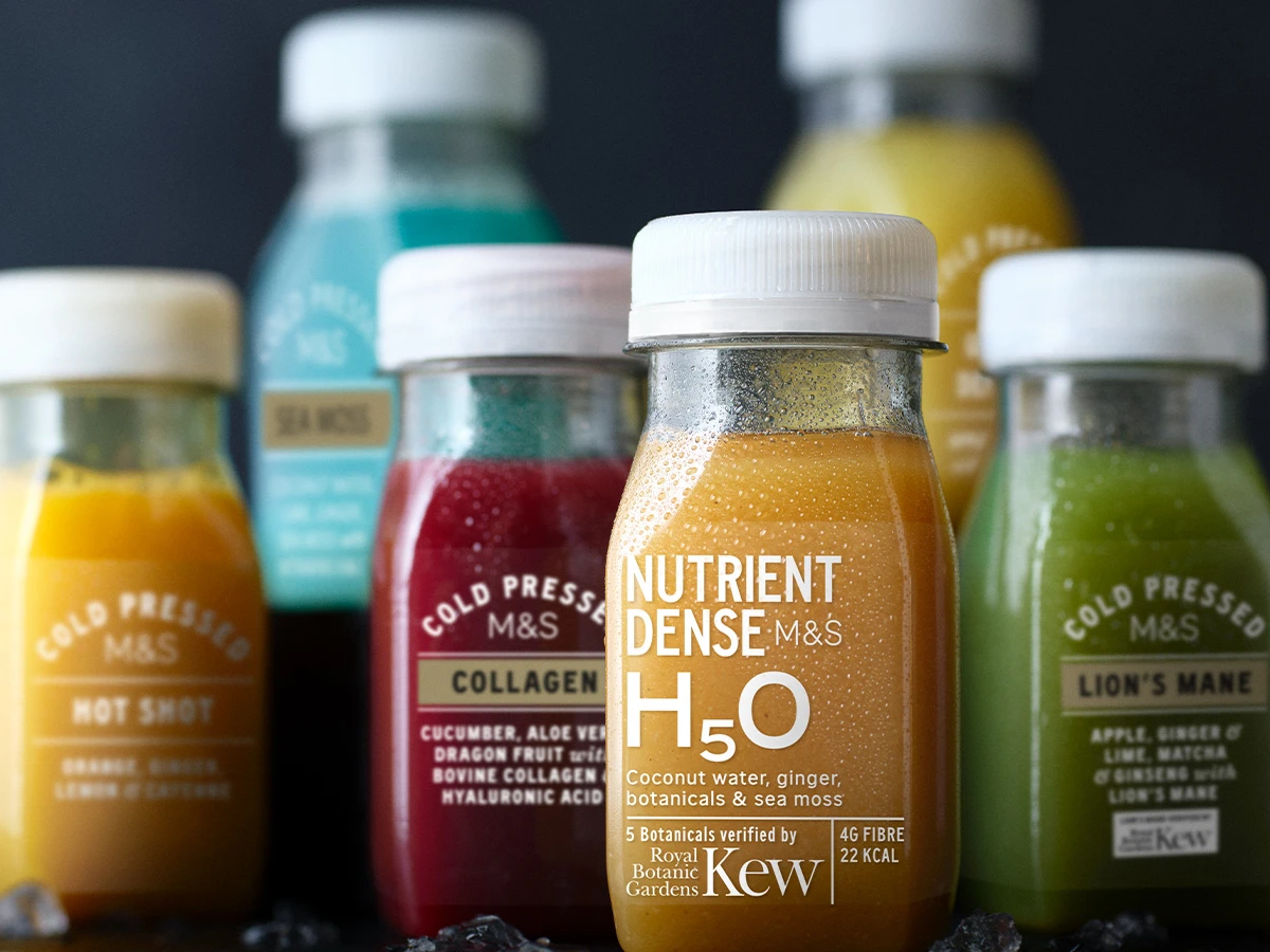 Six health juice shots lined up