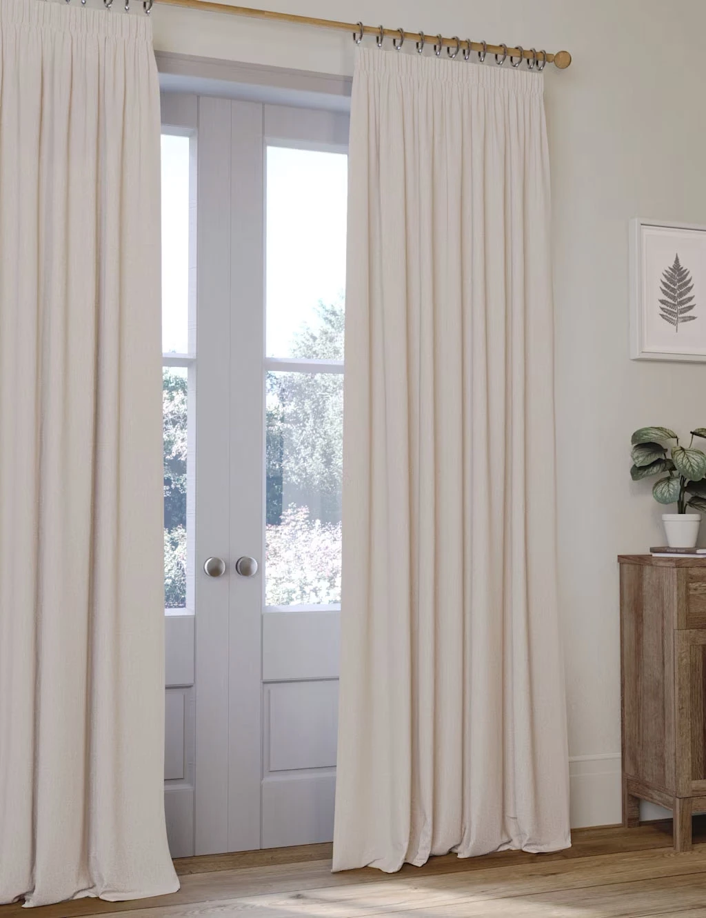 French doors with cream blackout curtains