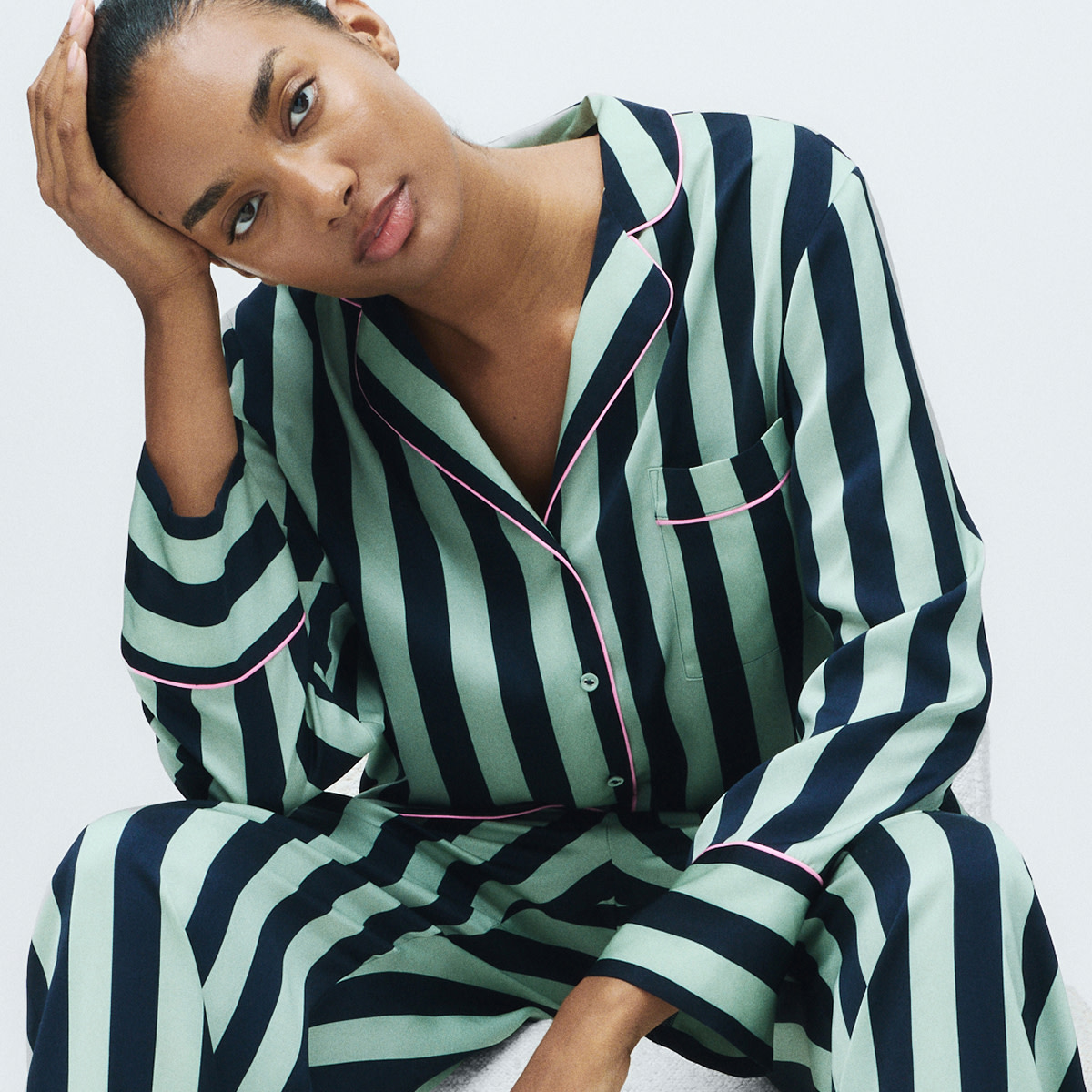 Woman wearing striped pyjamas