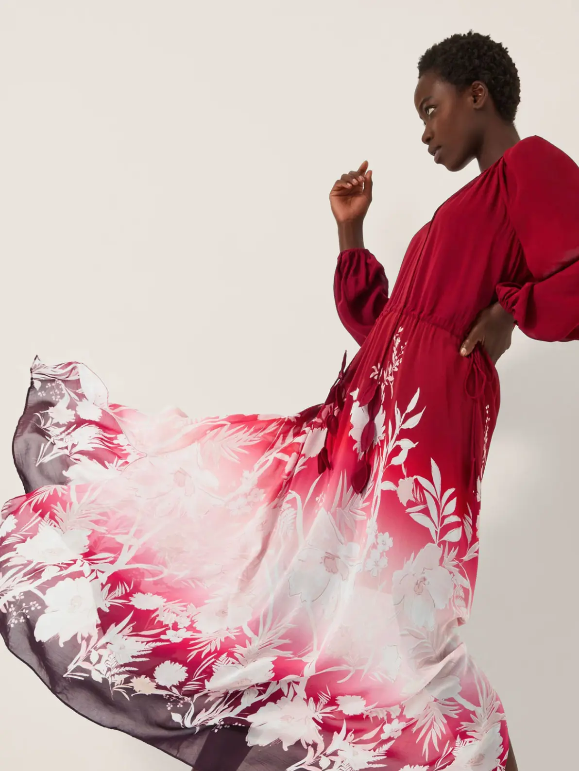 Woman wearing red and white ombre printed dress