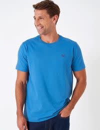Man wearing blue t-shirt. Shop 3 for 2 Crew Clothing tops