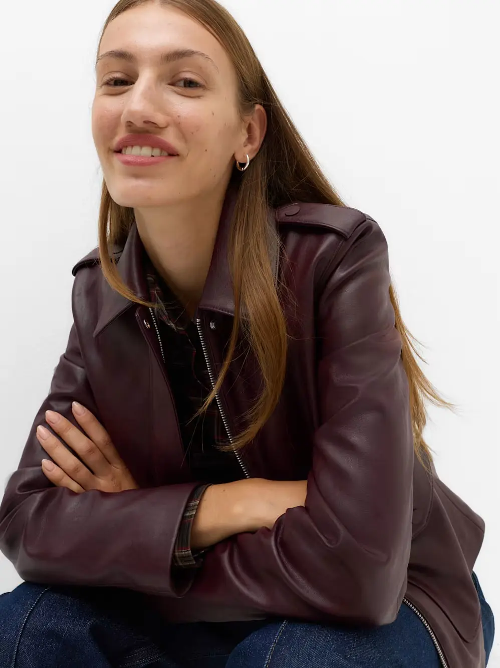 Woman in red leather jacket