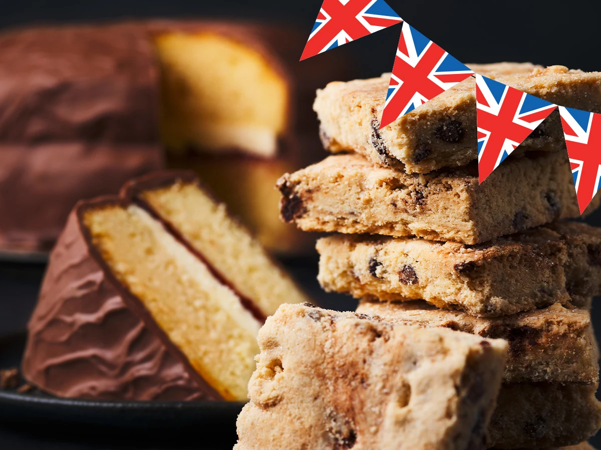 Stack of shortbread squares and slice of chocolate cake