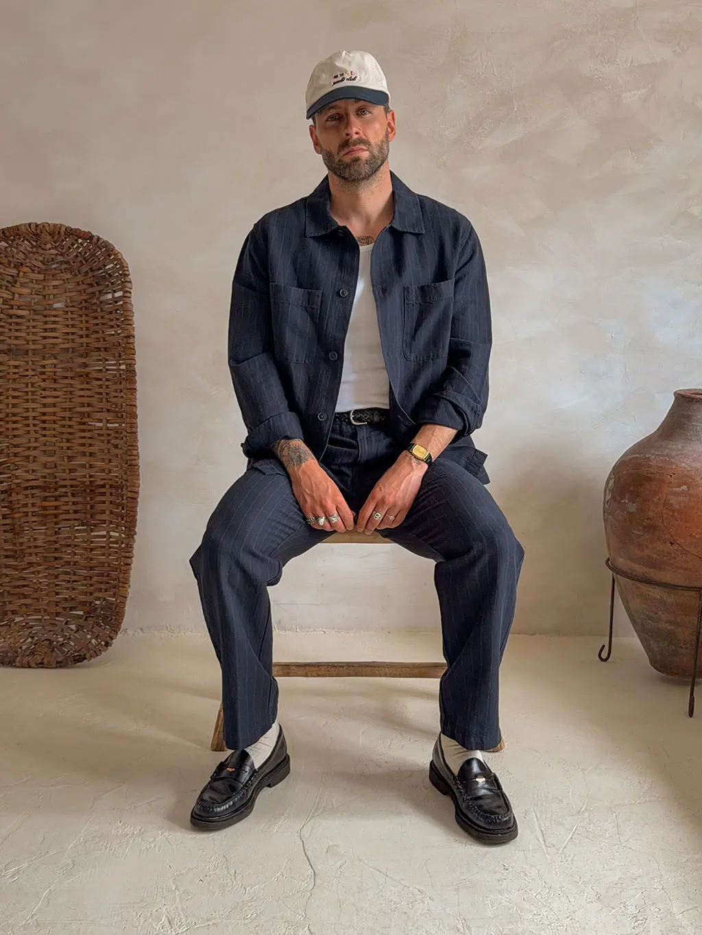 Man wearing matching navy set