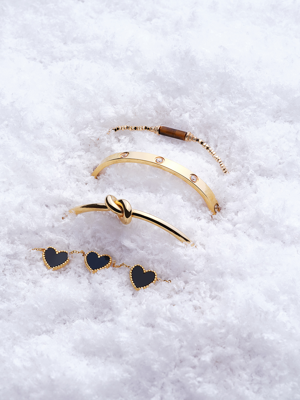 A selection of gold bracelets and bangles