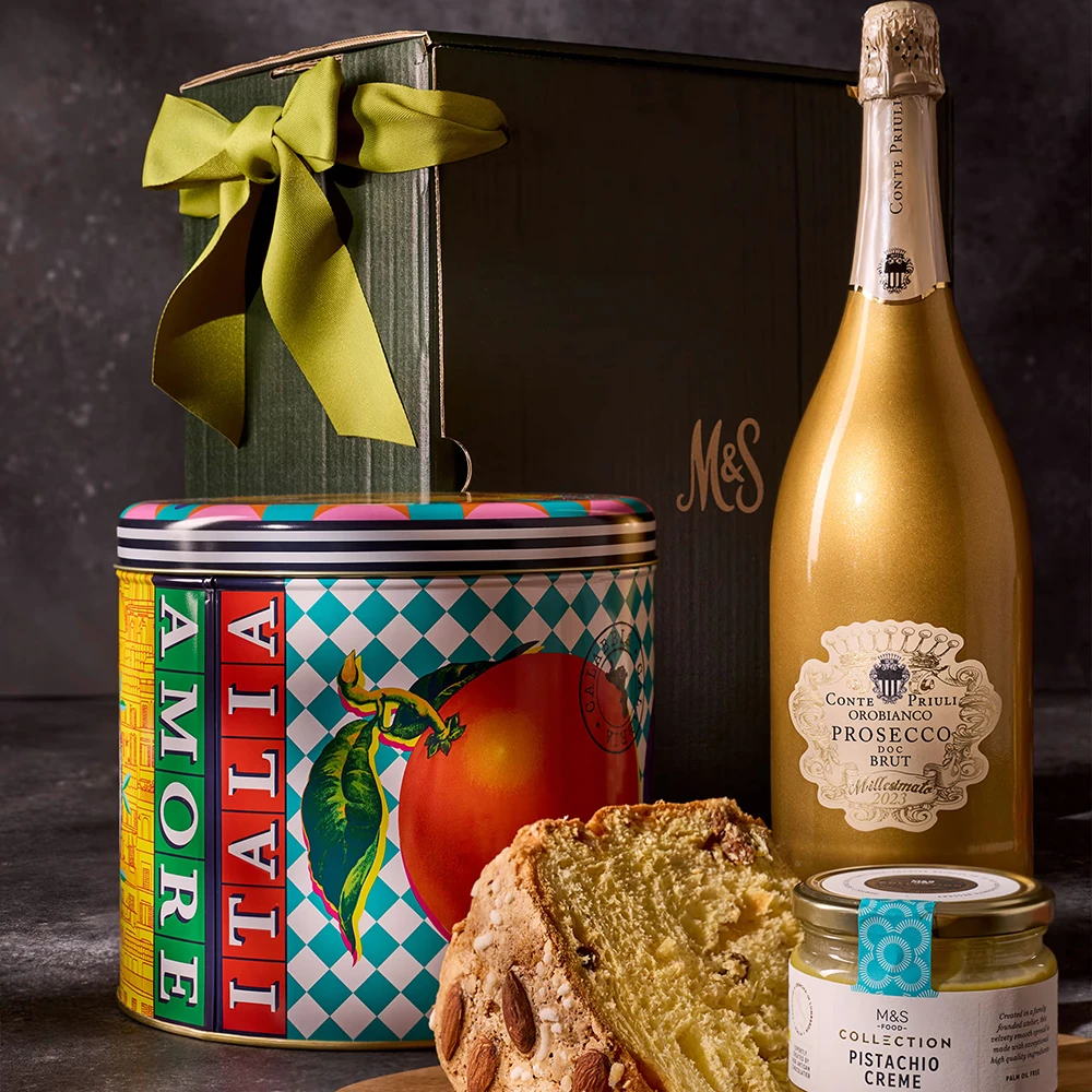 Wicker basket hamper gift in shape of a cottage