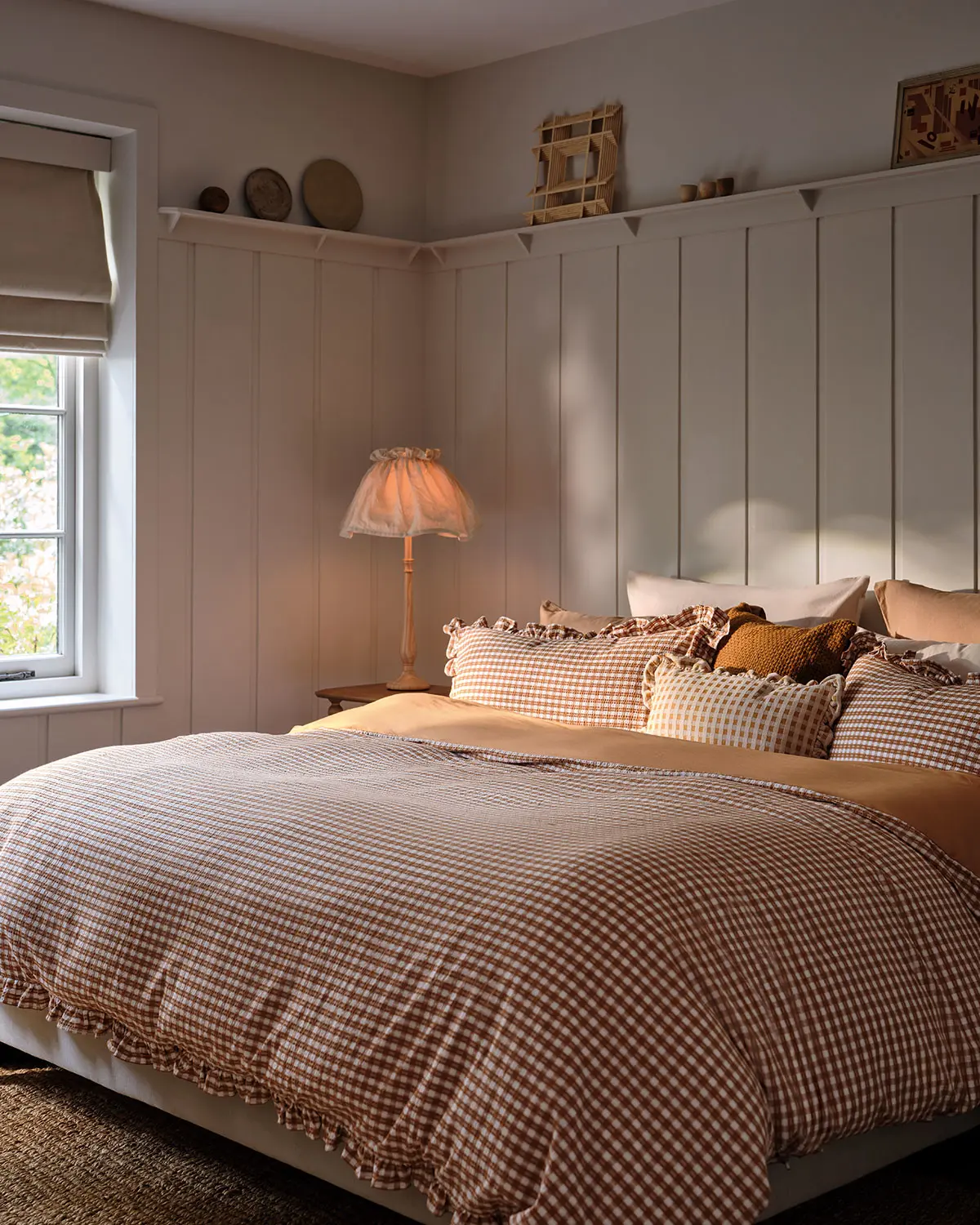 Bedroom with cosy gingham bedding