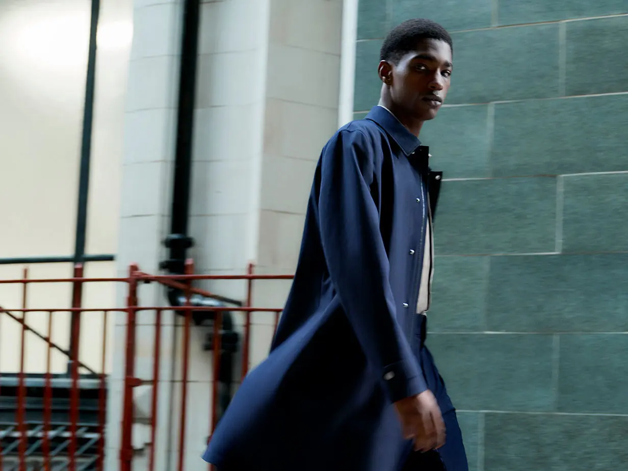 Man wearing blue coat from Autograph Performance