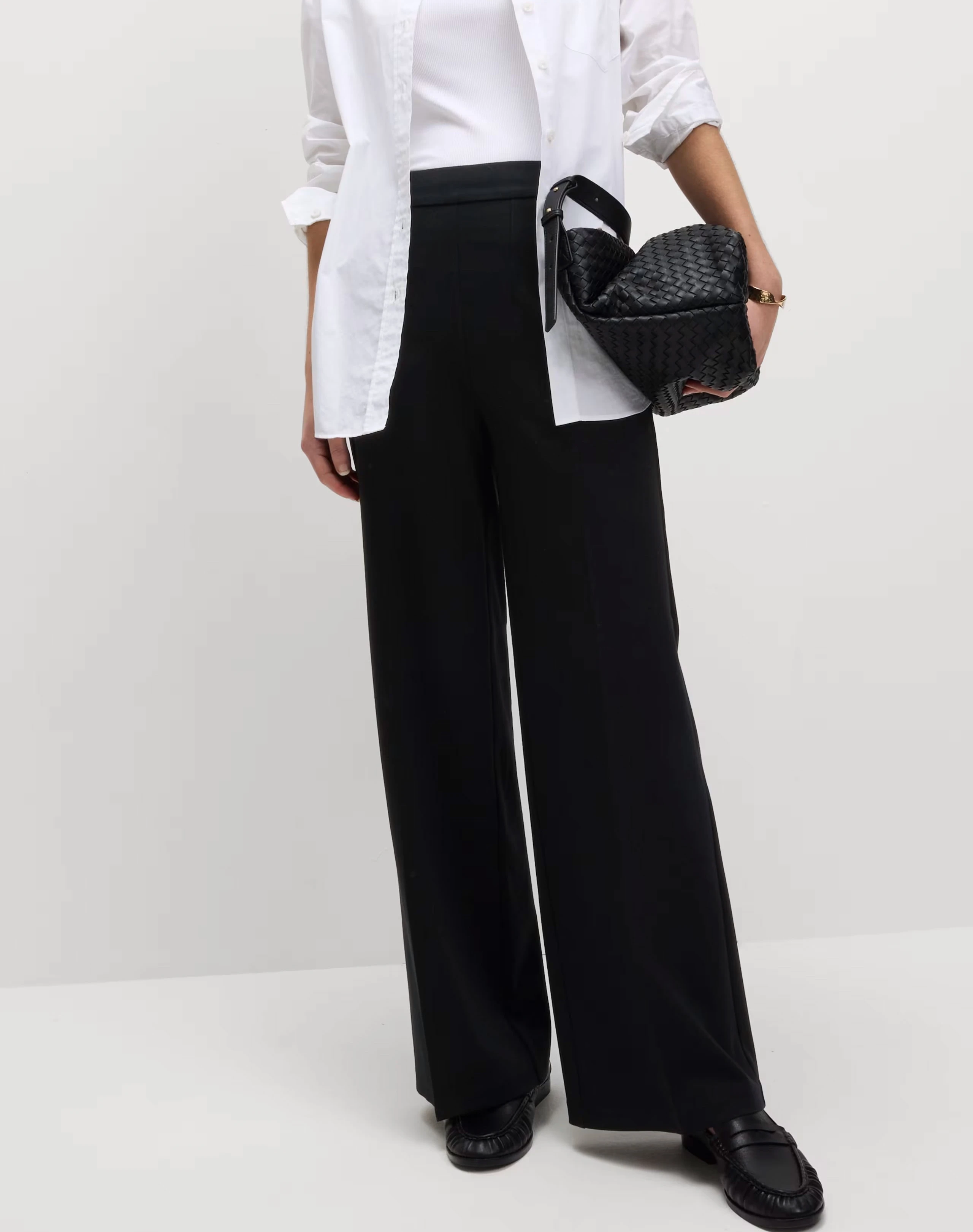 Woman wearing wide-leg trousers