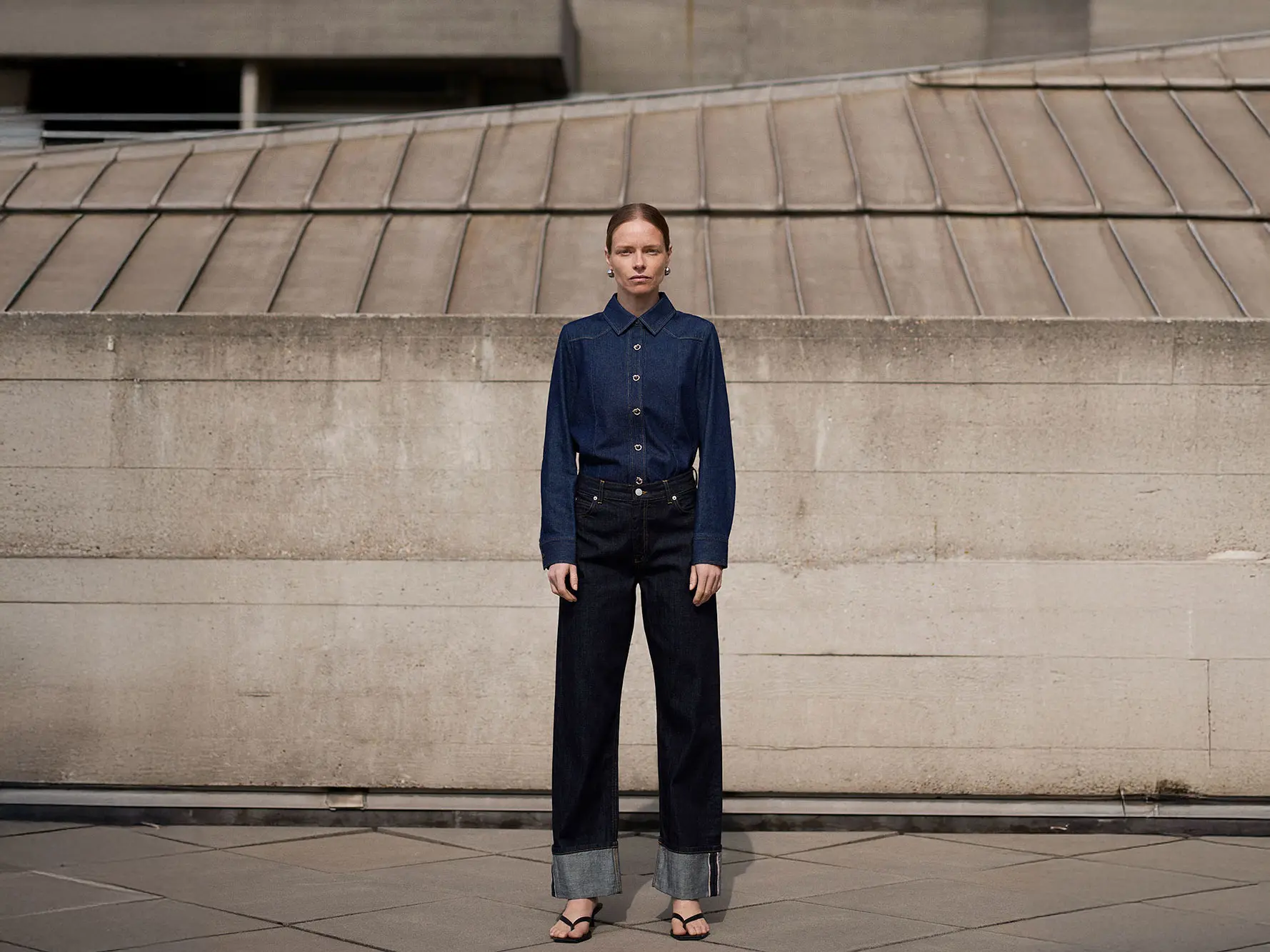 Woman wearing Whistles denim shirt and jeans