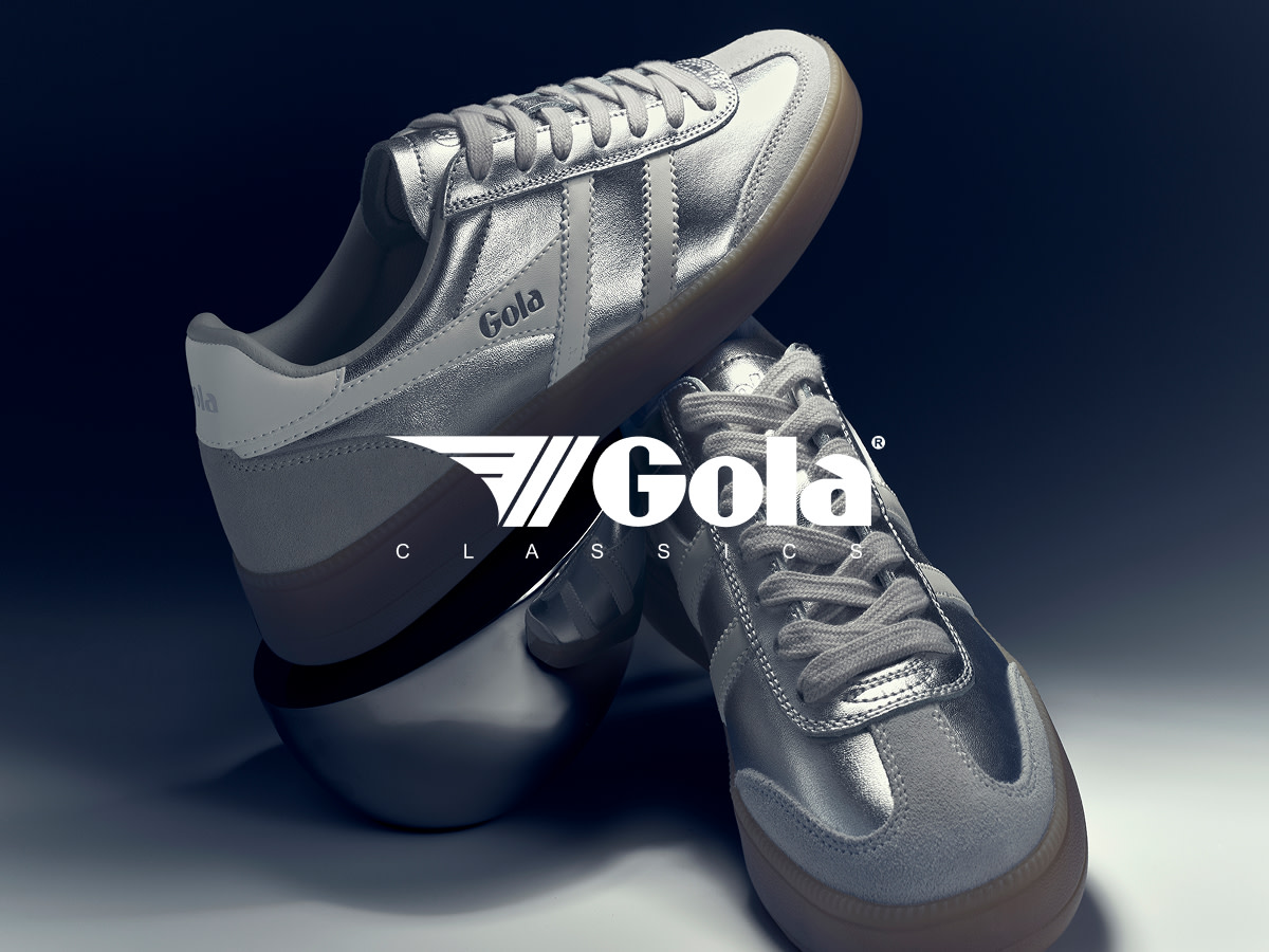 Silver and white Gola trainers