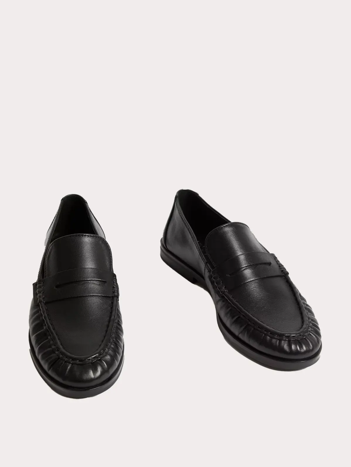 A pair of black loafers