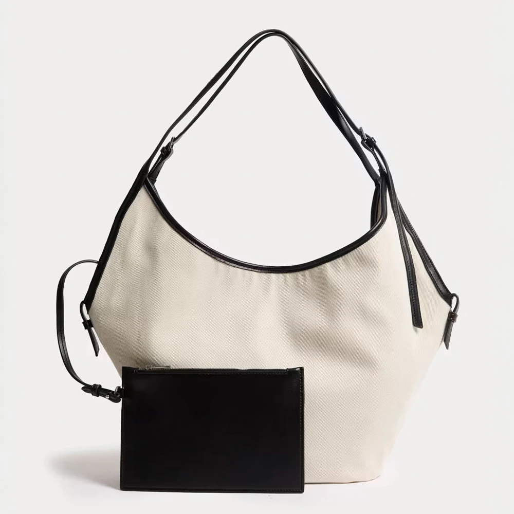 Black and white canvas tote bag with matching purse