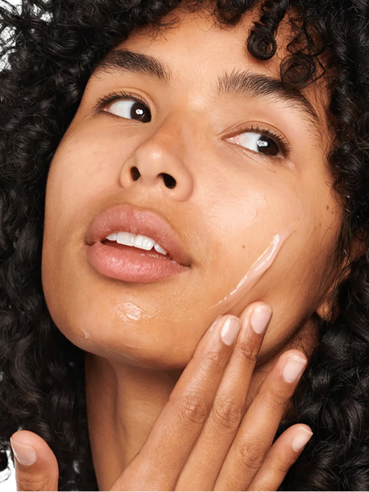 Gif of woman applying moisturiser and Clinique's moisture surge cream