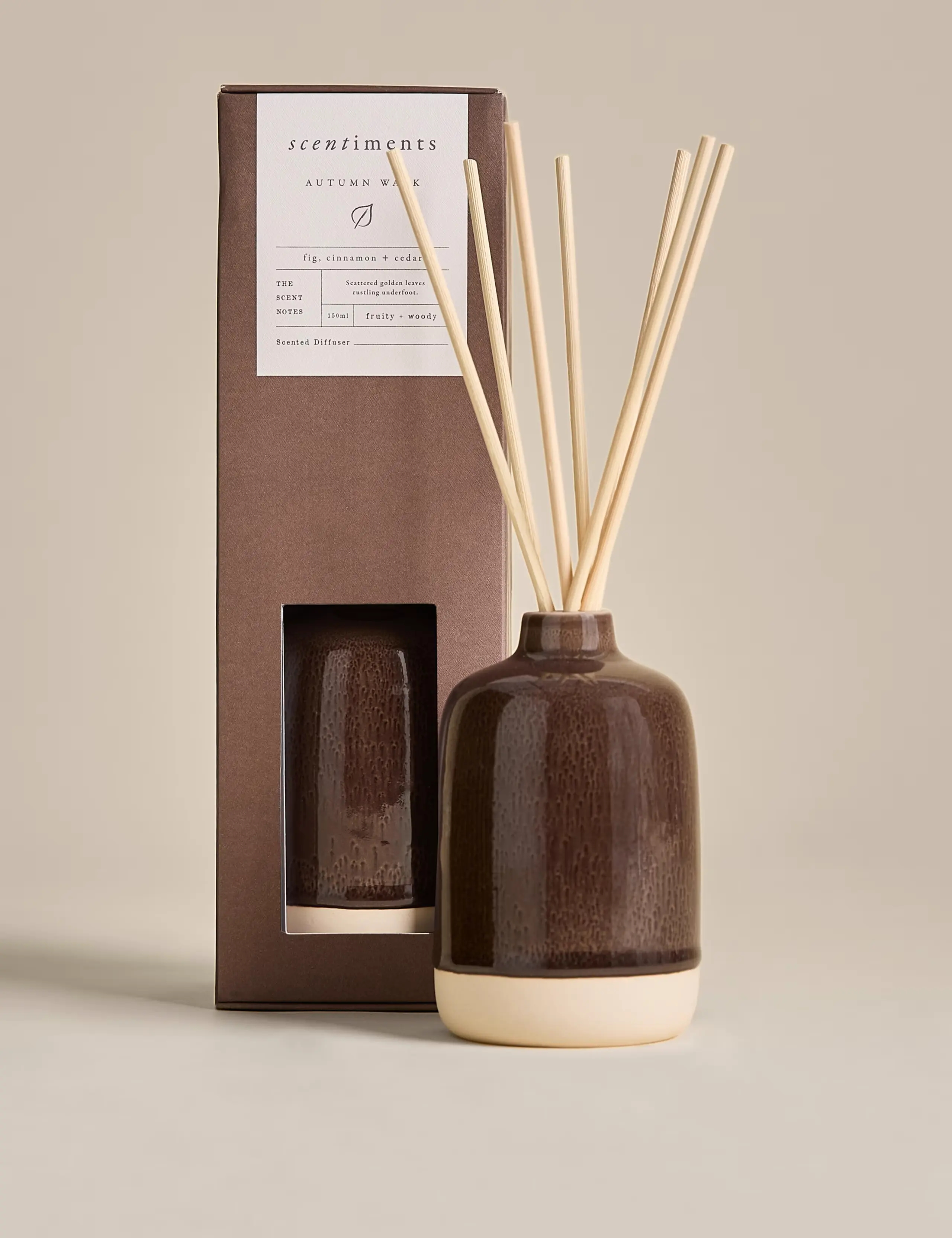 Autumnal scented diffuser in a brown ceramic votive.