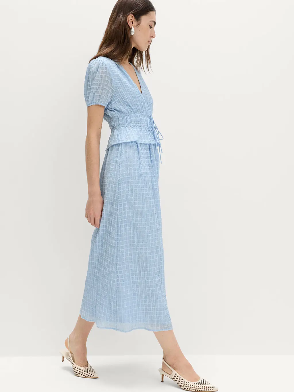 Woman in blue dress