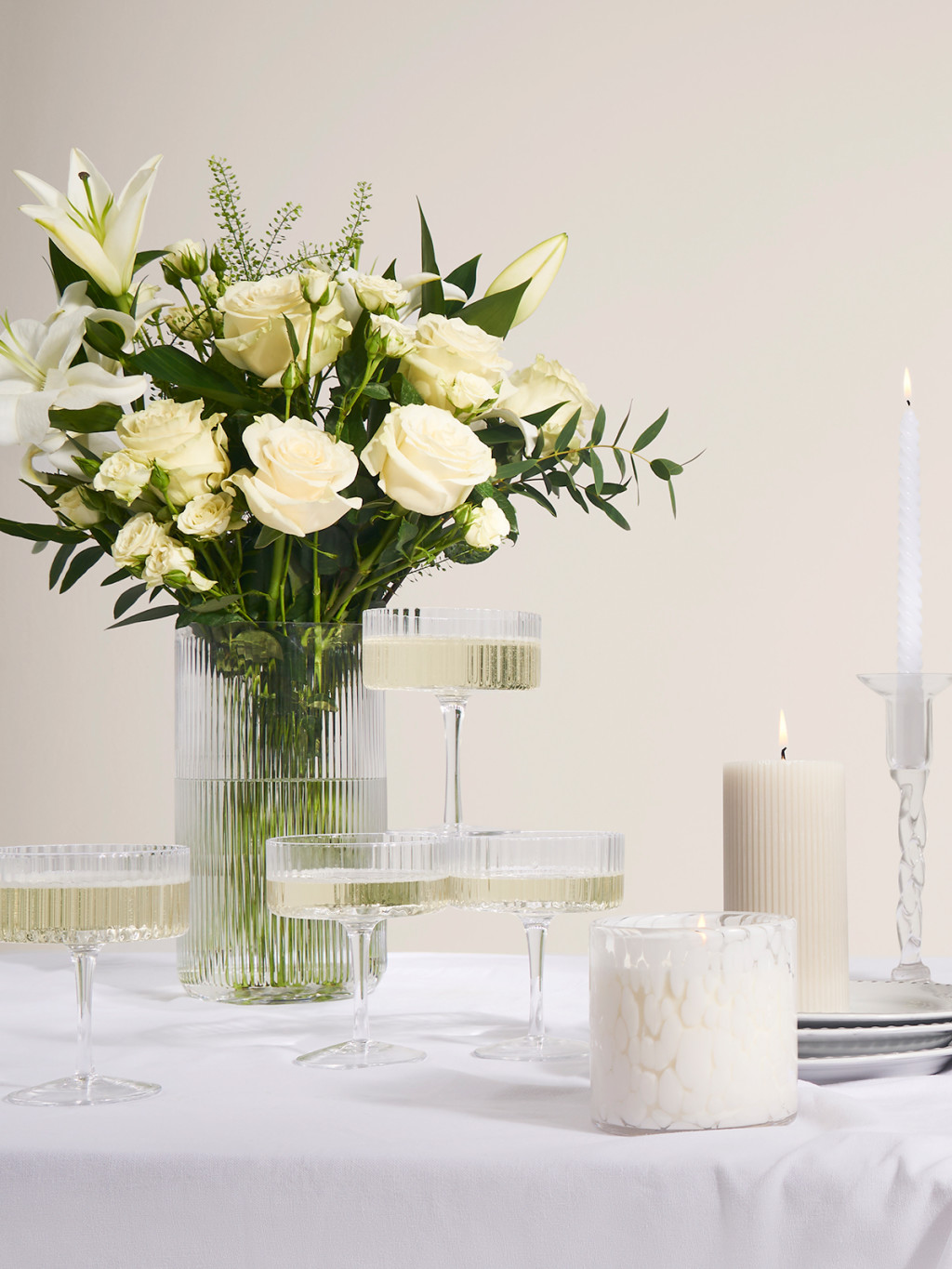 White bouquets with set of candles. Shop wedding gifts