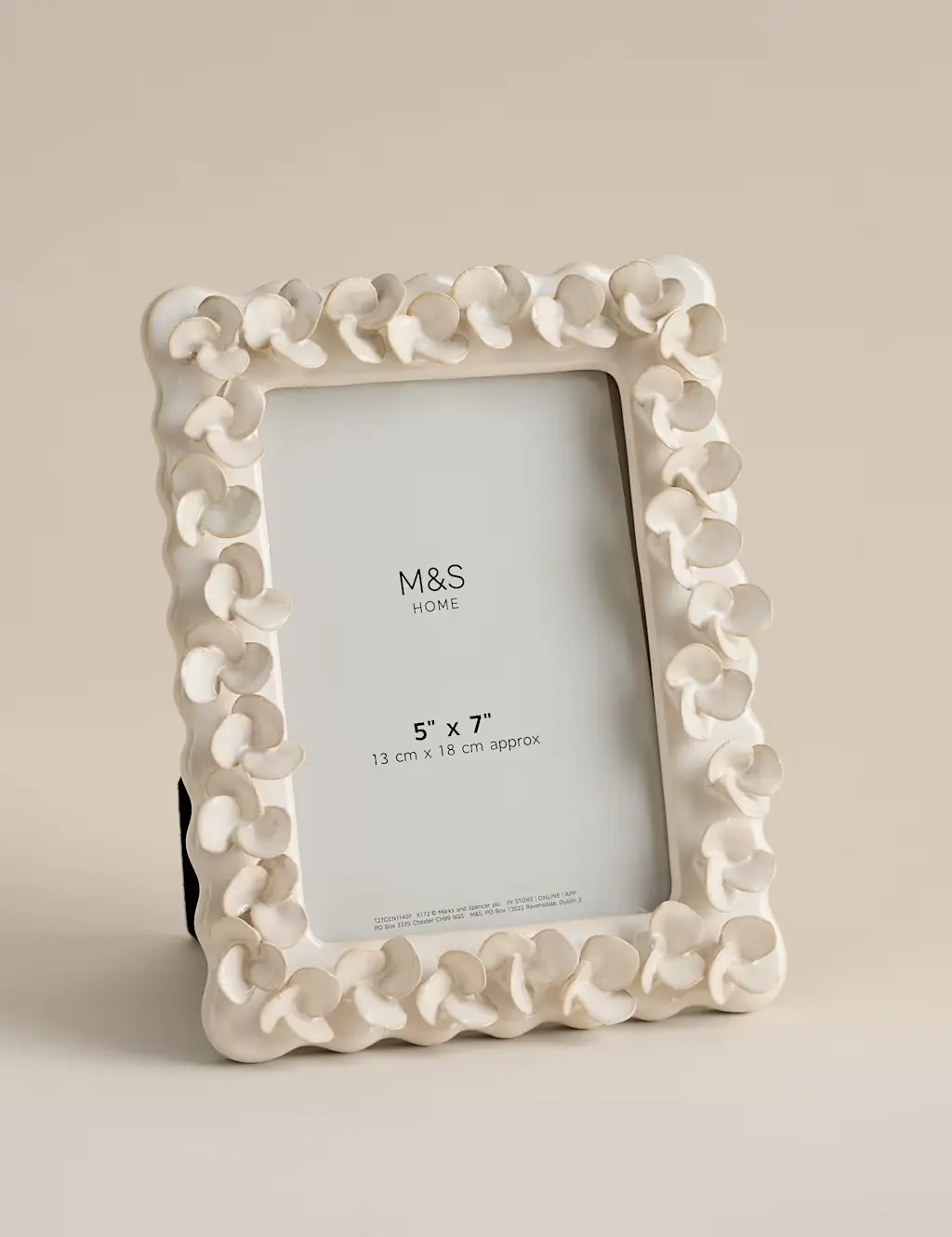 White picture frame with petals
