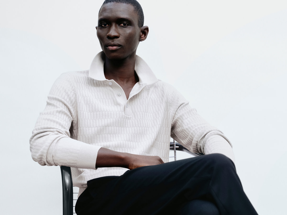 Man wearing white jumper