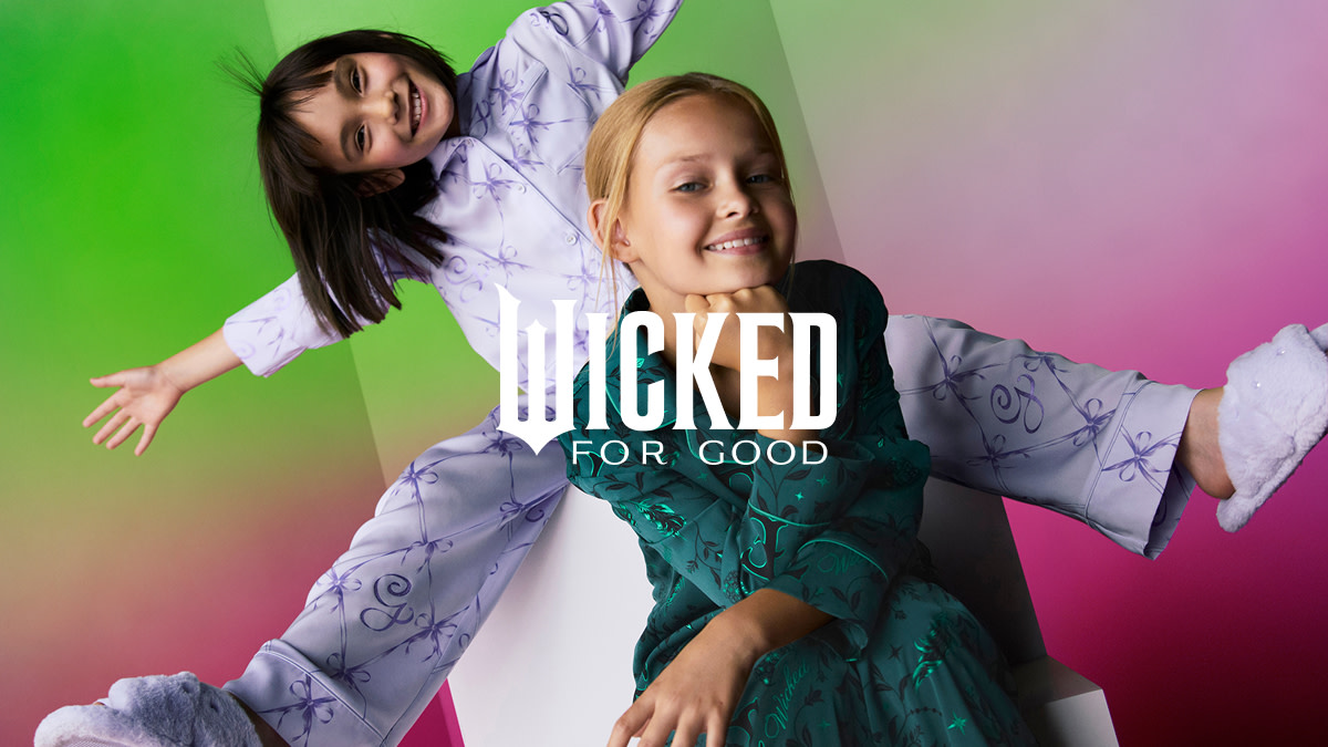 Two girls wearing Wicked pyjamas