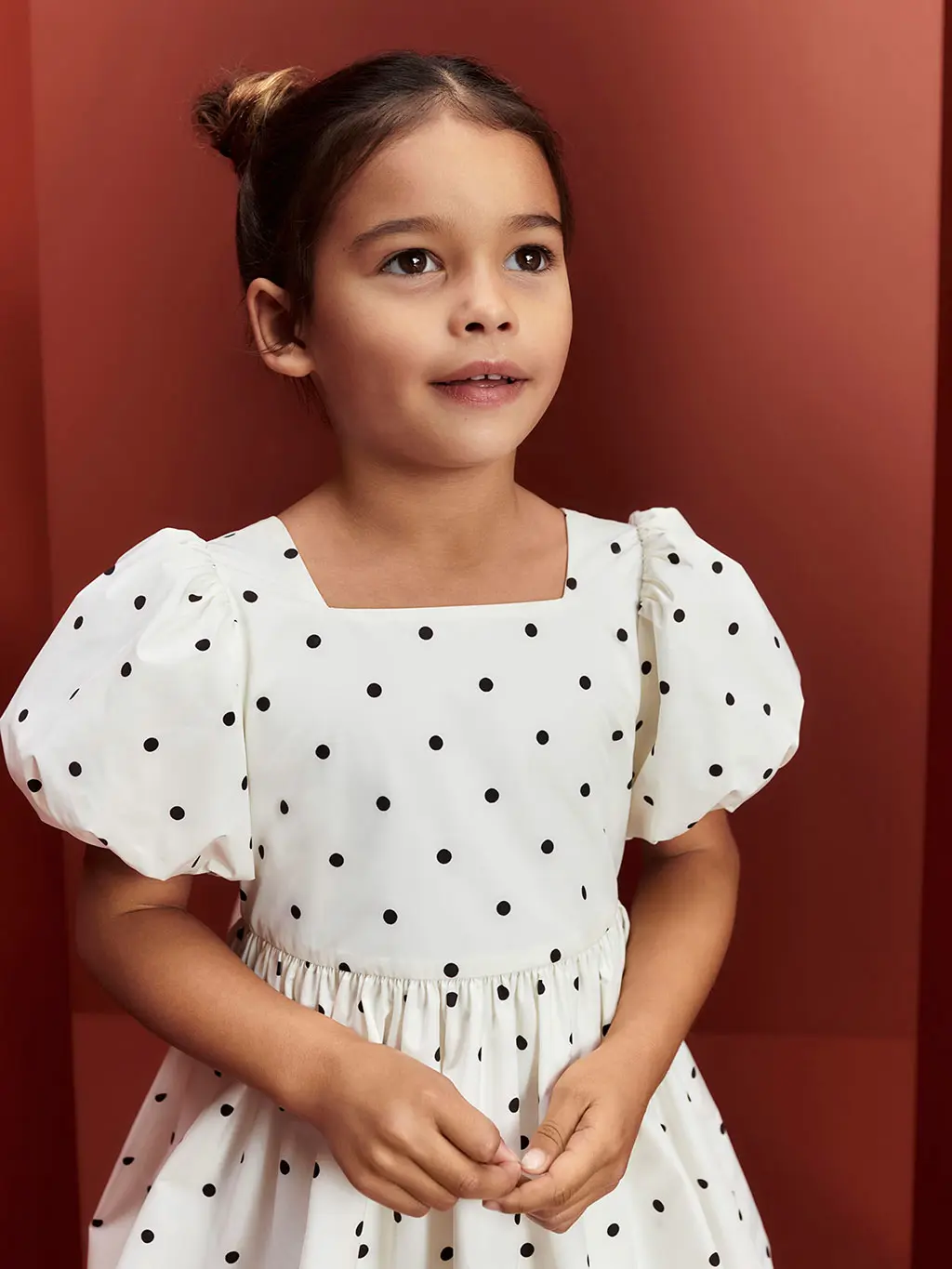 Girl wearing a polka-dot dress