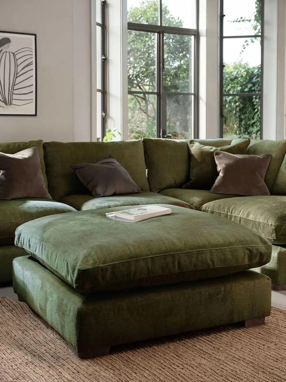 Green sofa and footstool