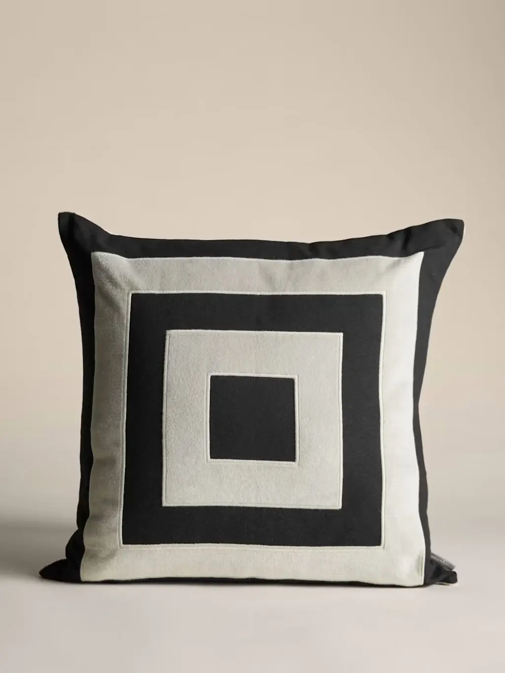 A monochrome cushion from the Kelly Hoppen x M&S collection