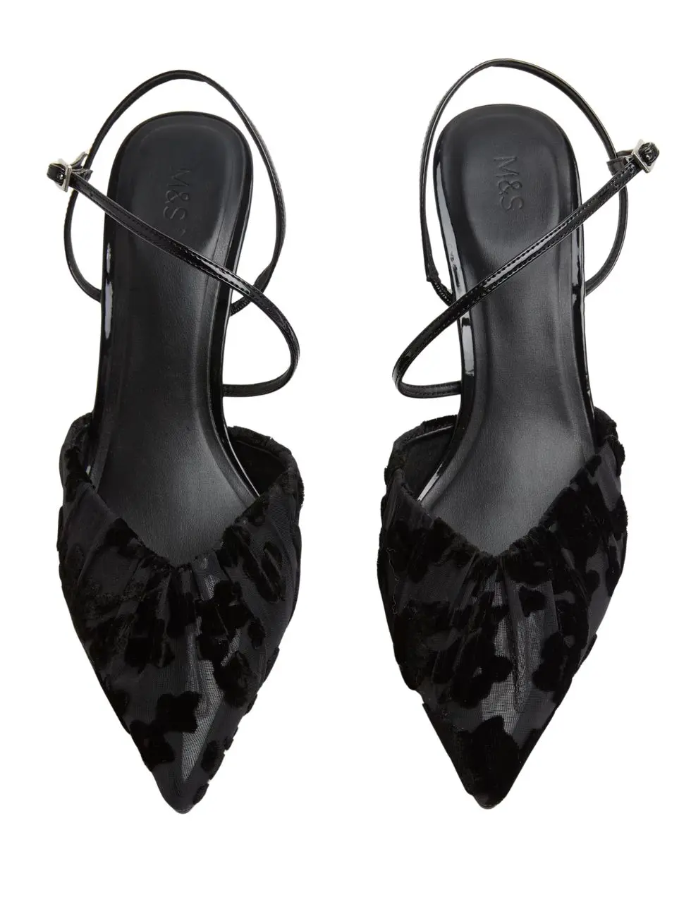 A cut out of black ruched slingbacks