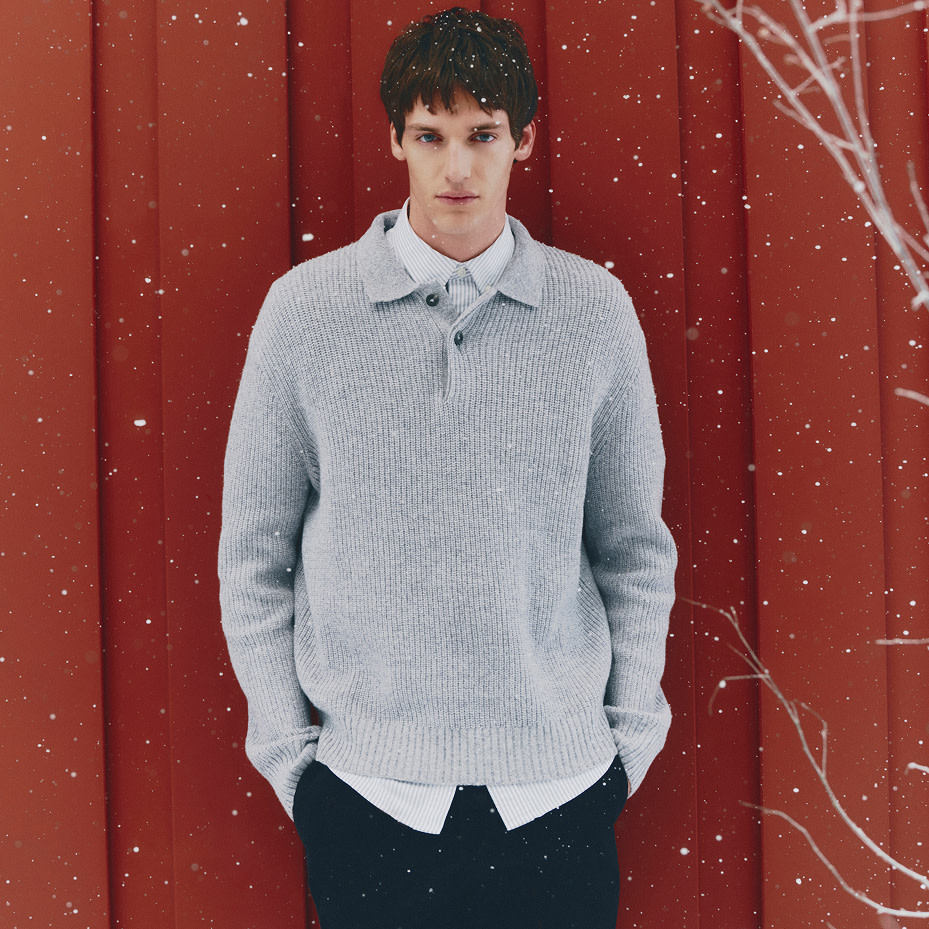 Man wearing grey Jumper