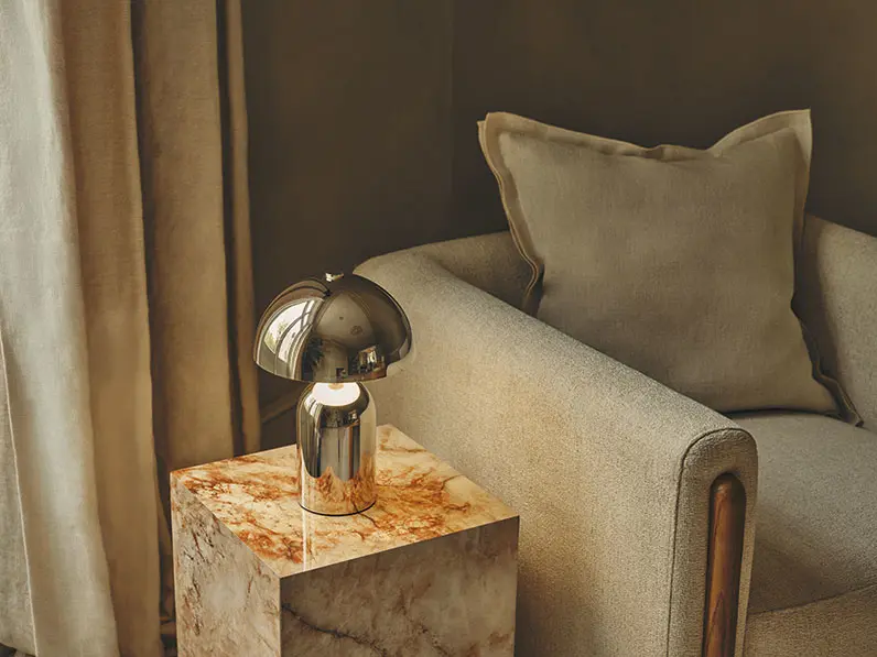 Living room with chrome lamp