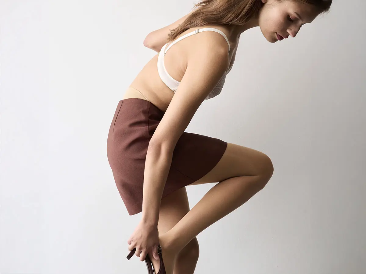Woman wearing beige tights