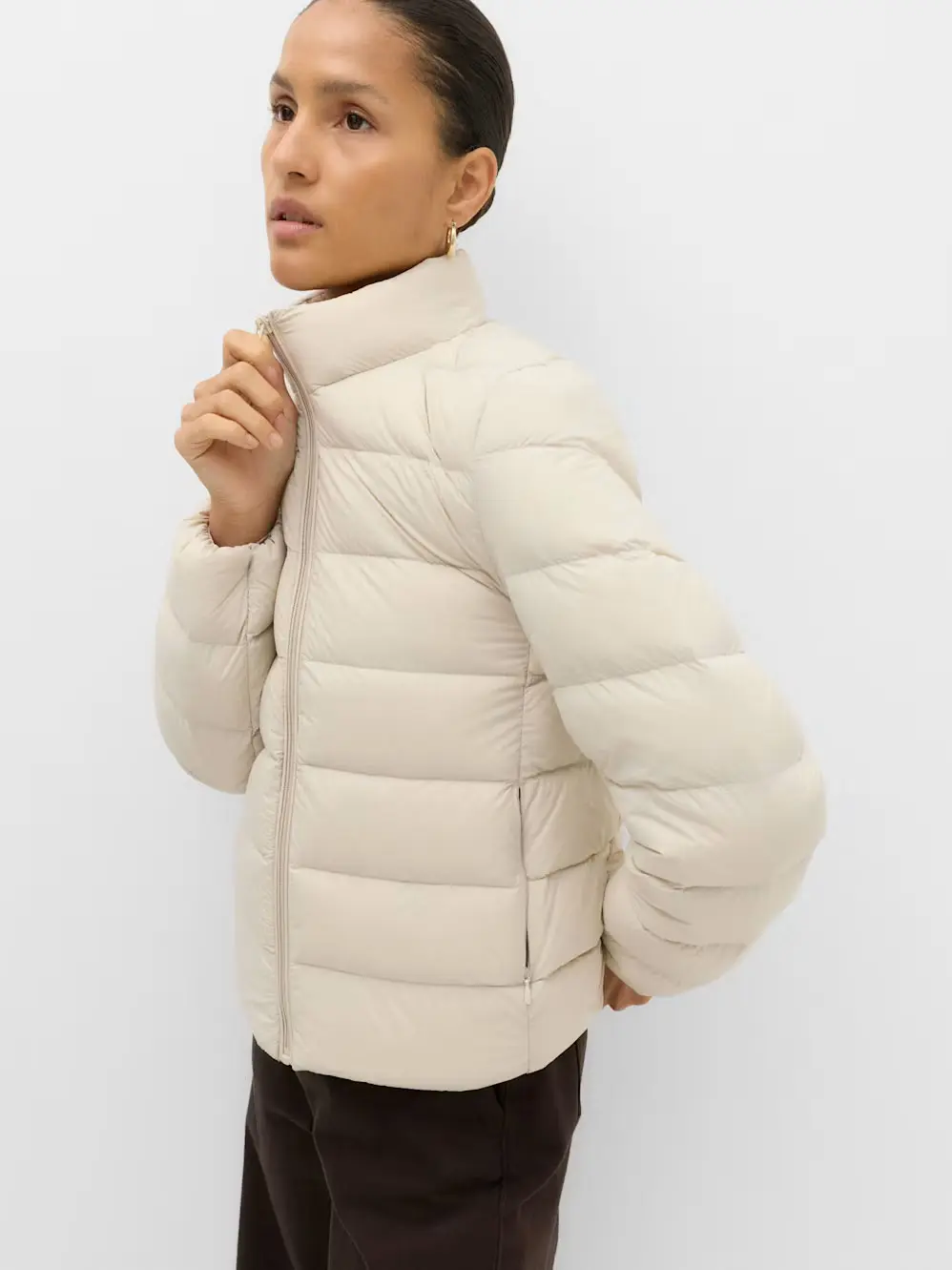 Woman in white puffer jacket