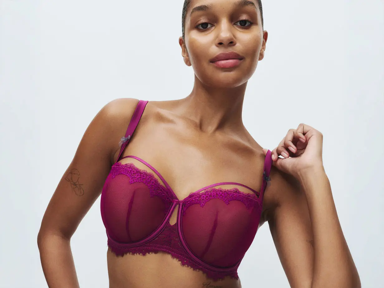 Woman in burgundy bra for bigger busts