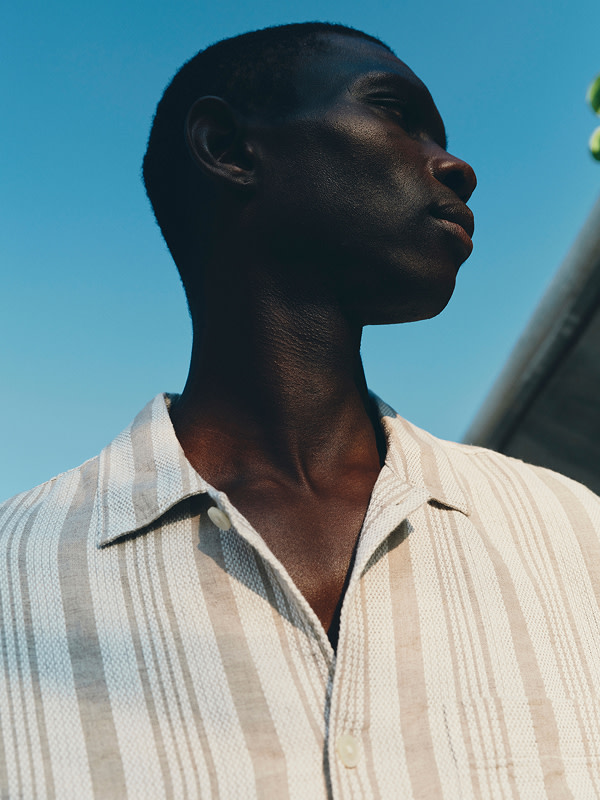 Man wearing striped shirt
