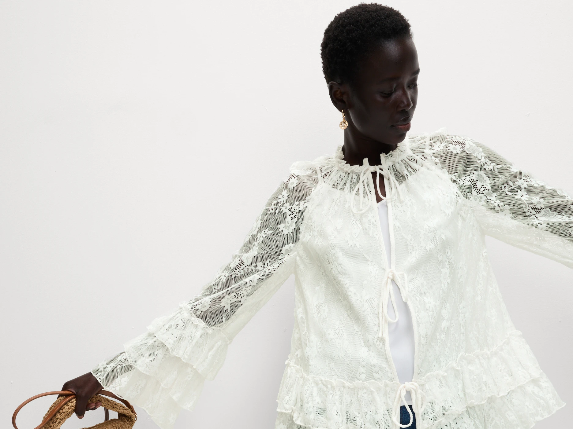 Woman wearing a white lace top
