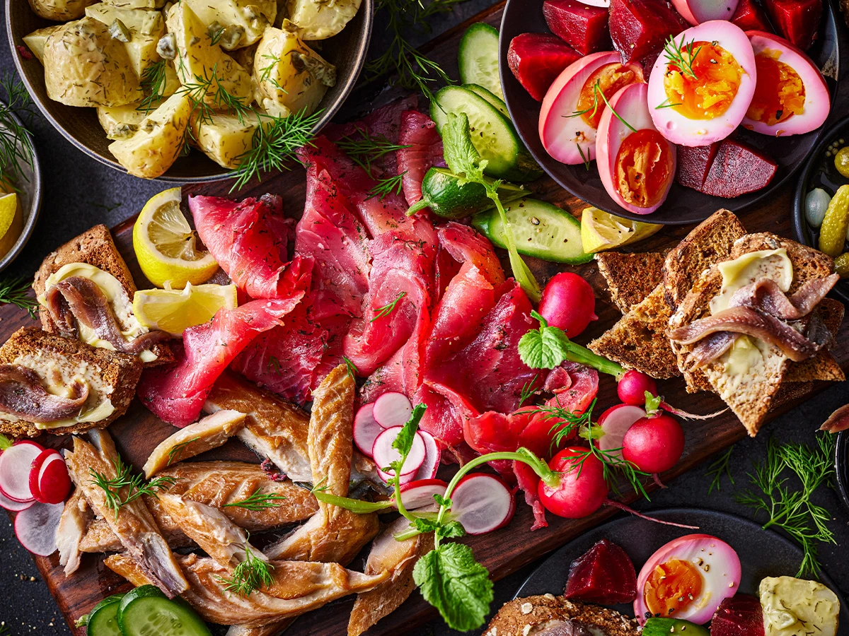 Scandi-inspired grazing board with smoked salmon, eggs, crackers, and more.