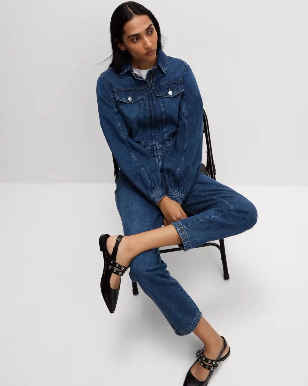 Woman wearing a denim jumpsuit at M&S