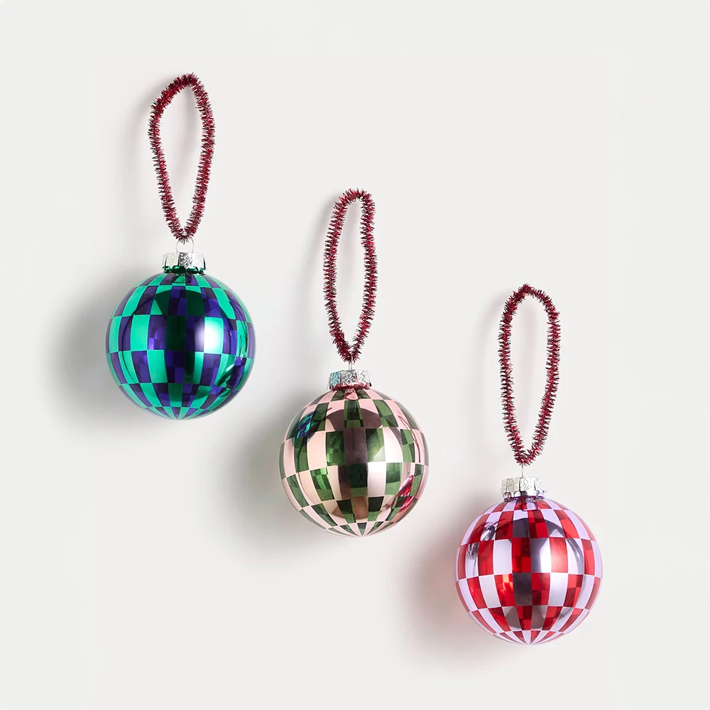 A trio of checkerboard baubles