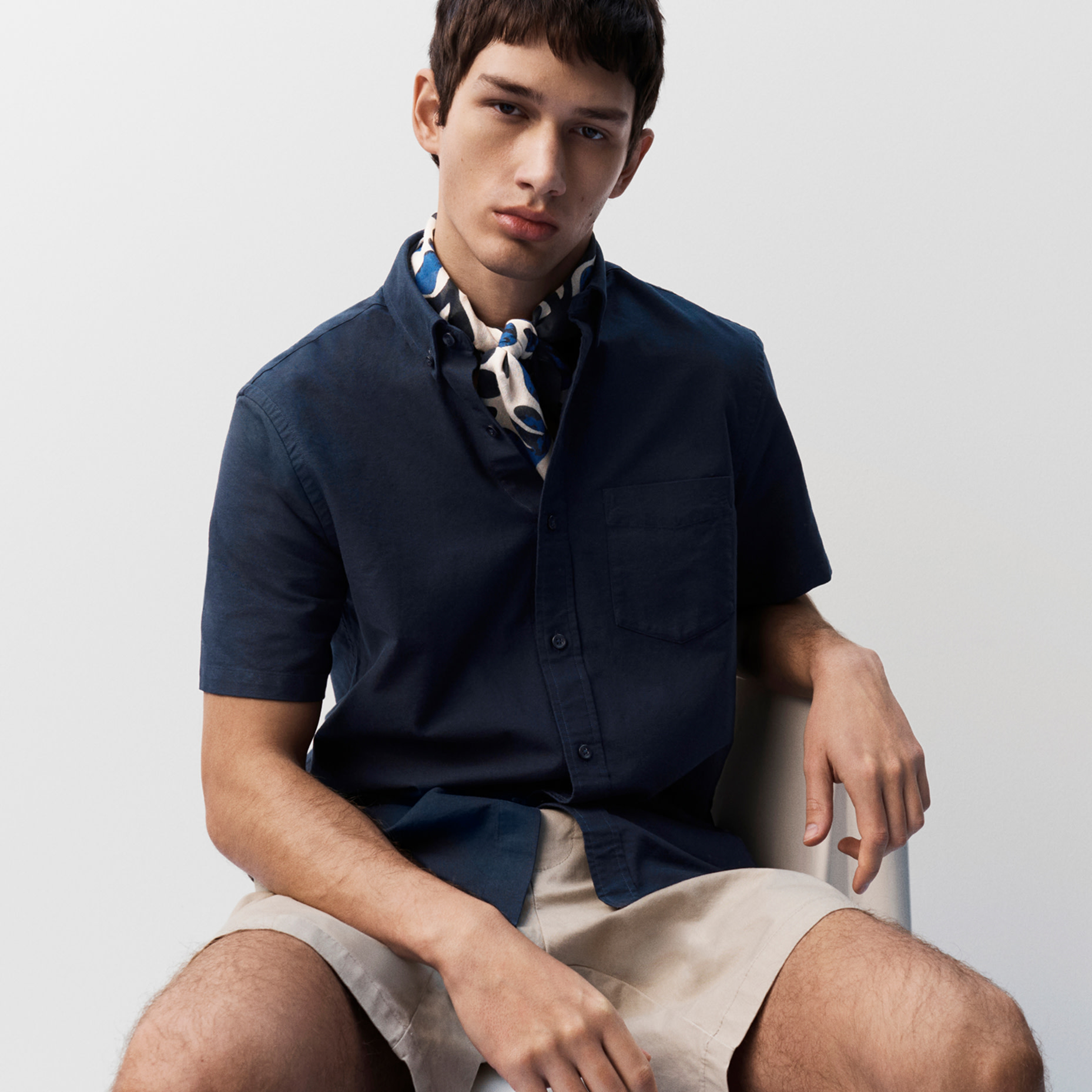 Man wearing navy shirt