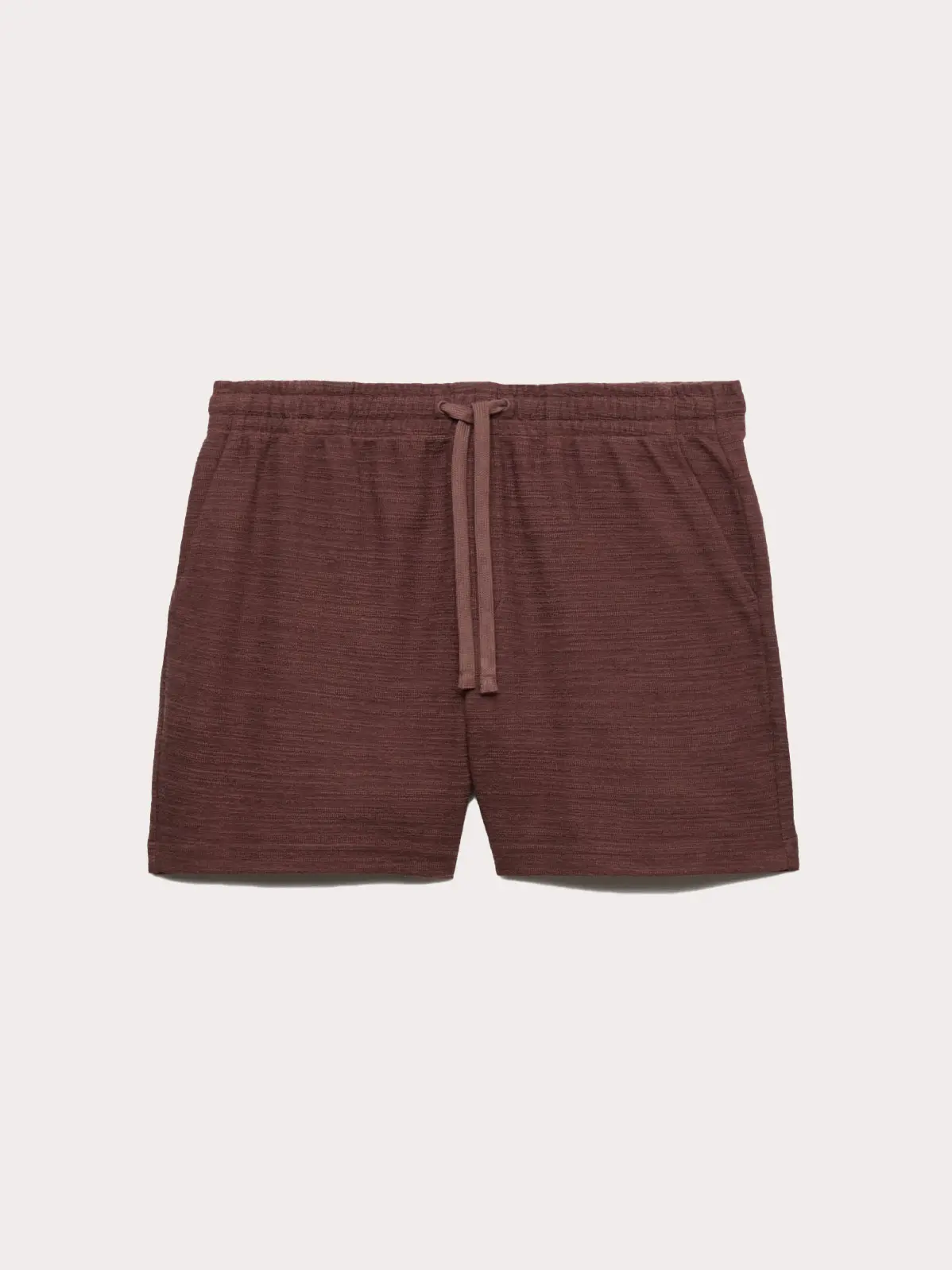 A pair of brown shorts 