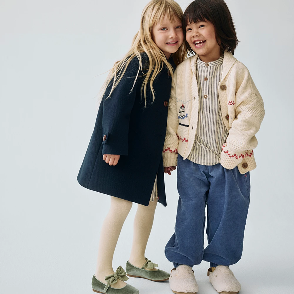 Two girls wearing outfits from the M&S x Binky collaboration
