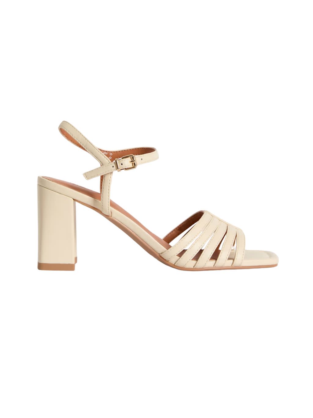 A pair of block heel strappy sandals in ivory