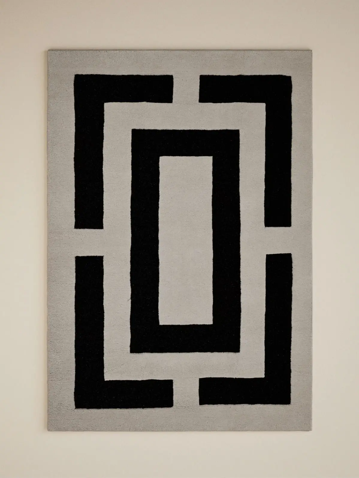 Geometric-pattern black and neutral rug