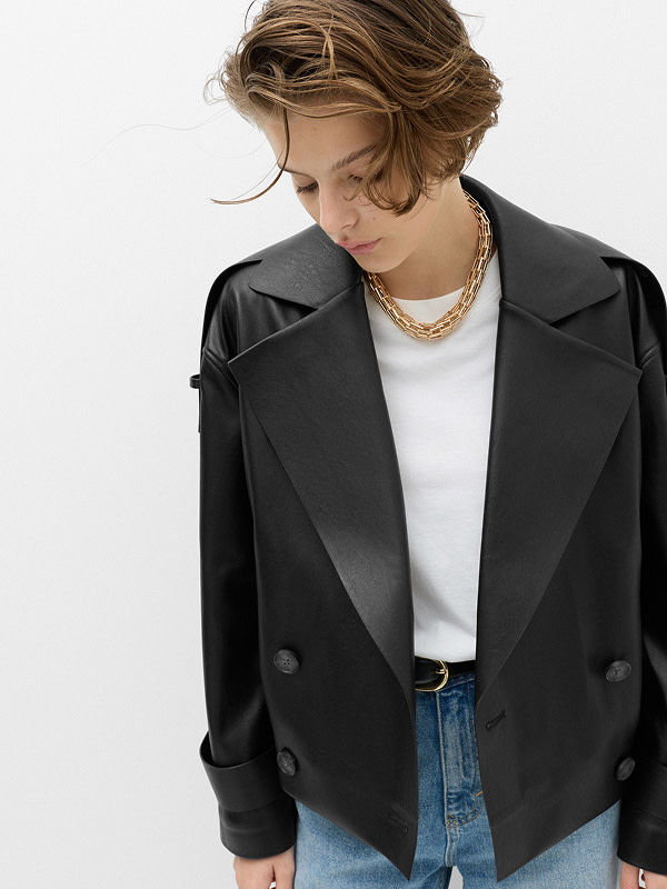 Woman in leather blazer