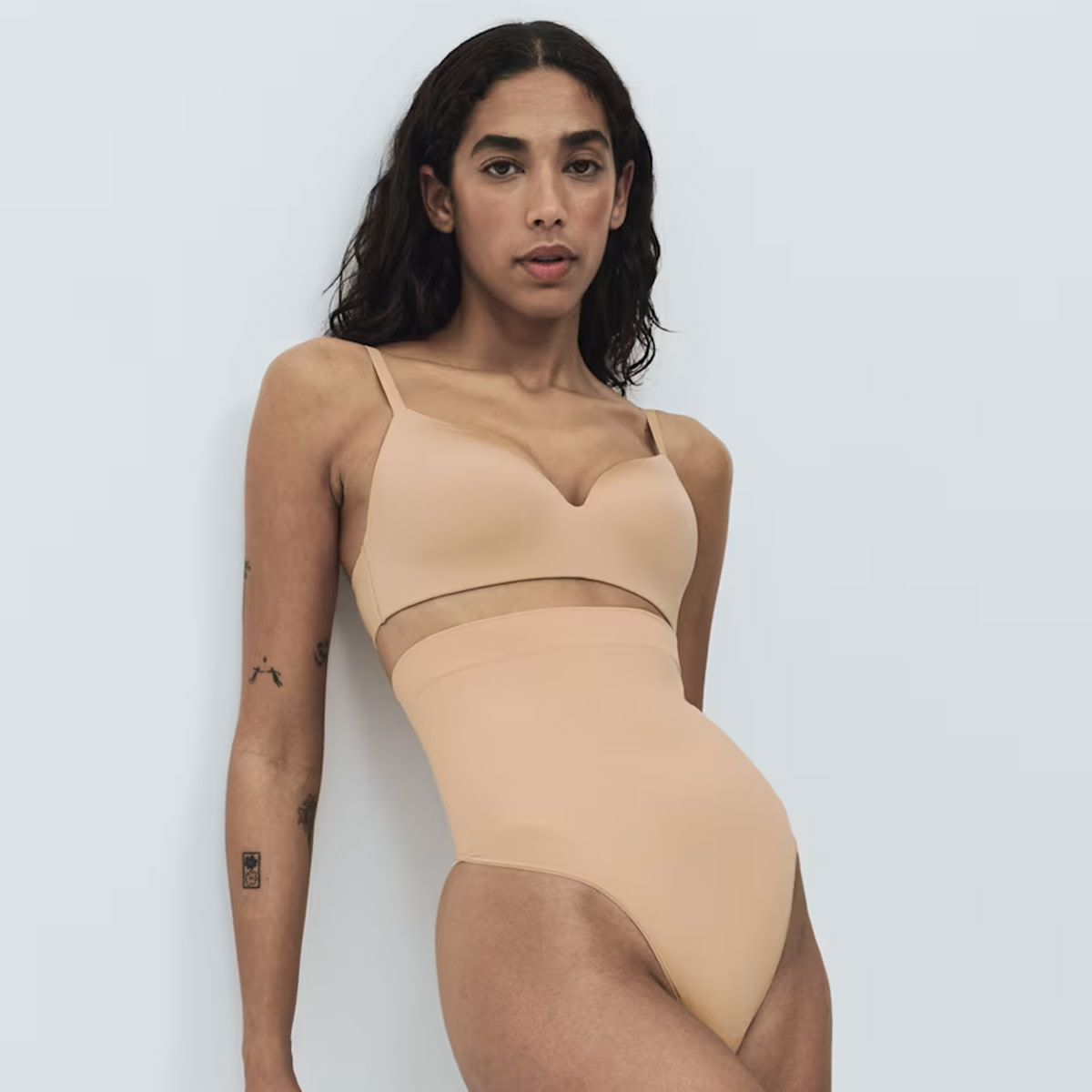 women wearing bra and shapewear