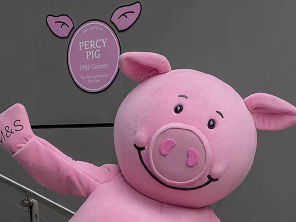 Percy Pig waving 