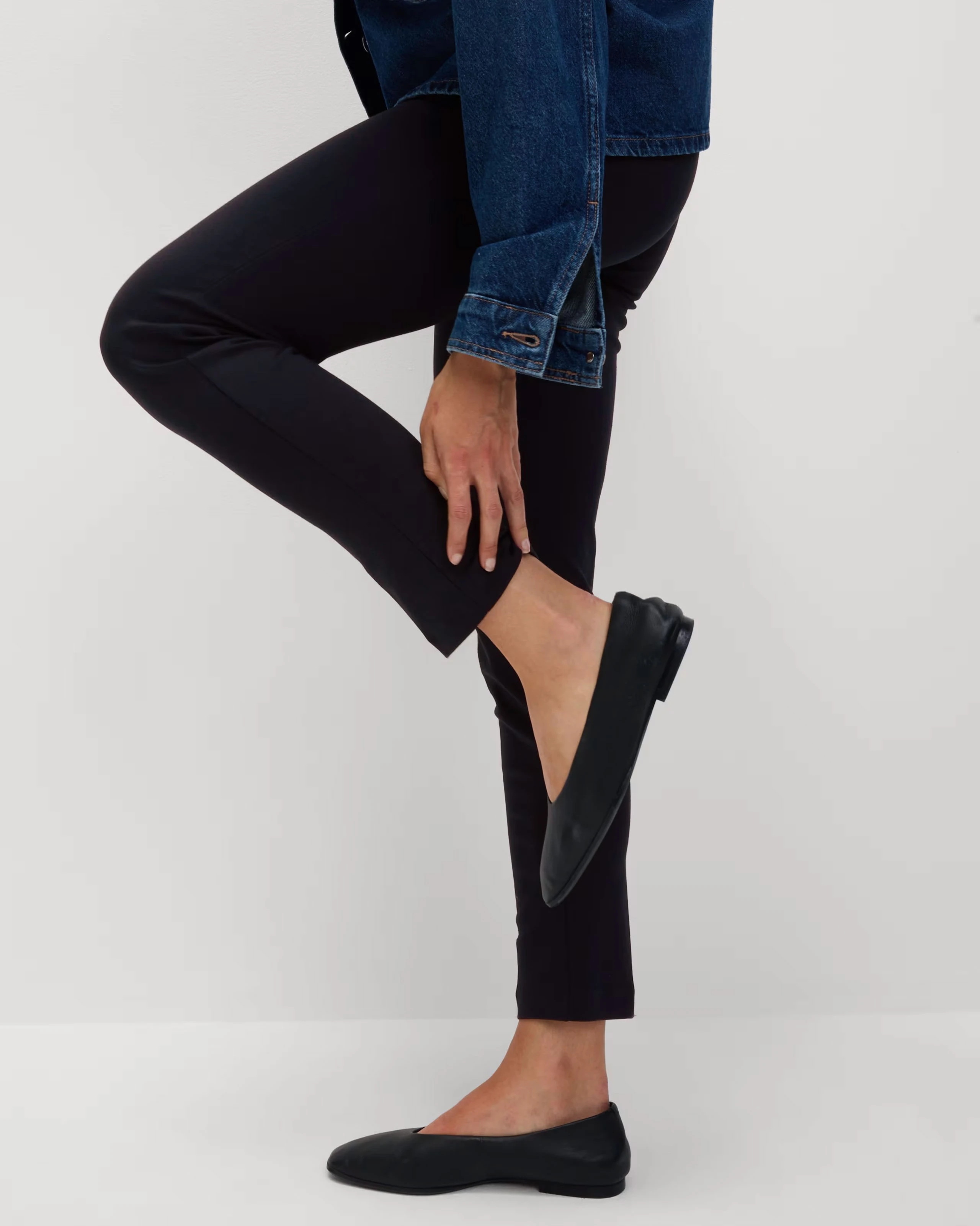 Woman wearing slim-fit trousers