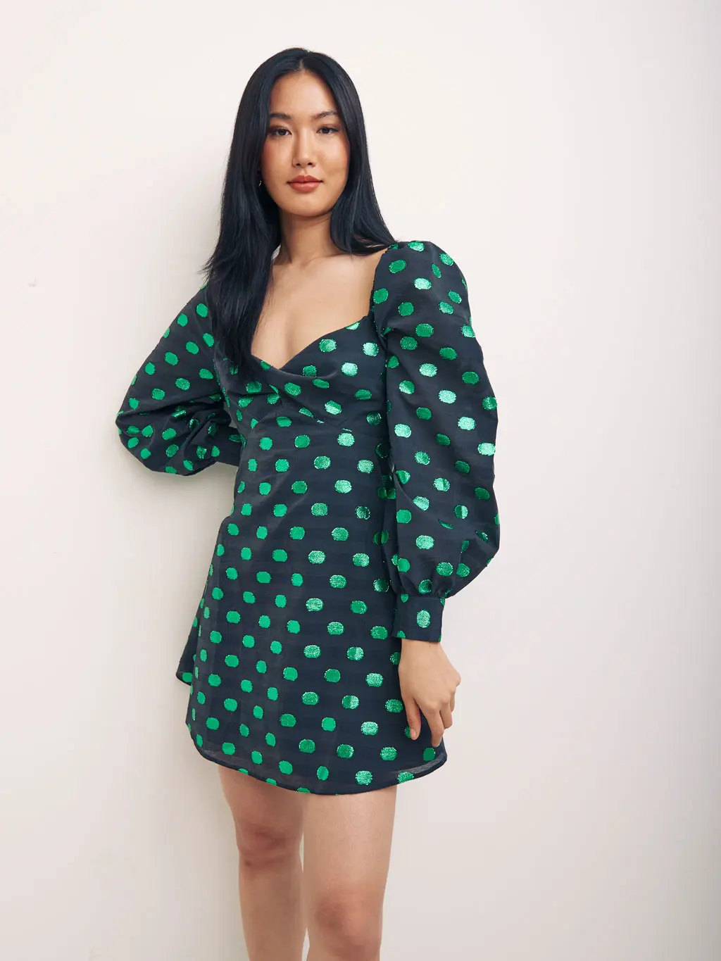 Woman wearing a Cotton Blend Polka Dot Mini Smock Dress from Nobody's Child